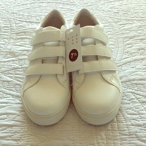 White slip-on sneakers